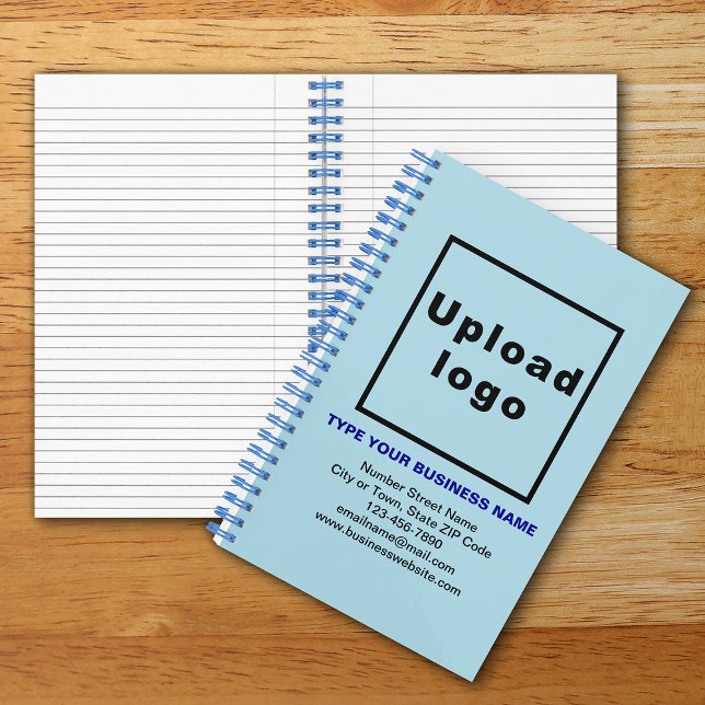 Marque commerciale sur Carnet spiral bleu clair (Your business brand on light blue spiral notebook. Notebook to build brand name awareness.)