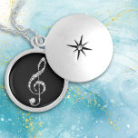 Médaillon Avec Fermoir Faux Diamond Treble Clef sur la musique noire<br><div class="desc">Magnifique, ce collier qui présente une fausse clef à trémesure formée de diamant. L'image est placée sur un arrière - plan noir pour un effet dramatique, mais vous pouvez facilement changer la couleur arrière - plan en la customisant. Parfait pour l'élève, l'enseignant ou l'interprète de musique ! *Crédit de design...</div>