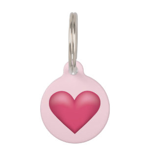 Médaillon Pour Animaux Forme de cœur rose sur fond rose clair avec les in