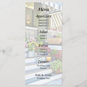 Menu Cape May NJ - Fleurs et arrosoirs sur le porche