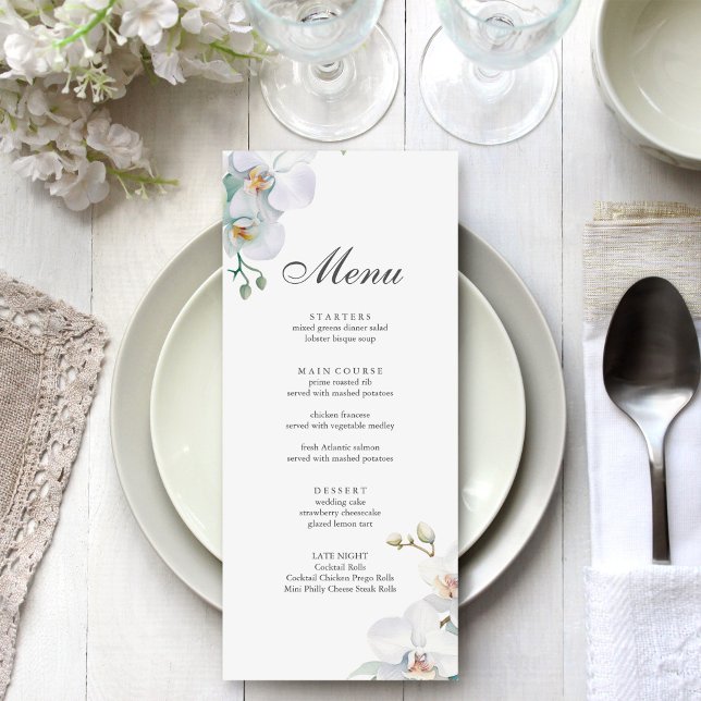 Menu Mariage Élégant Orchidée Sauvage Moderne  (Modern Elegant Wild Orchid Wedding Menu on a beautiful white and silver wedding dinner table.)