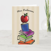 Merci Apple de professeur avec la pile de livre