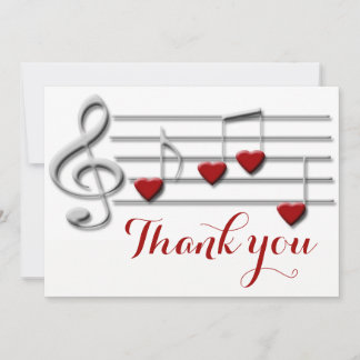 merci calligraphie sur les notes de musique cardia