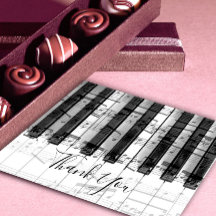 merci calligraphie sur musique notes piano