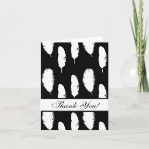 Merci en plumes noires et blanches