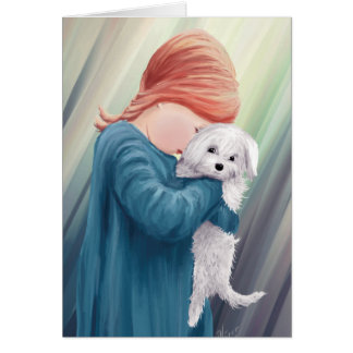 Mignonne fille serrant le chien blanc