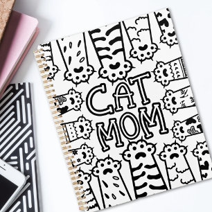 Mignonne maman chat noir et blanc avec pattes de c