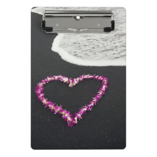 Mini Porte-bloc Lei en forme de coeur sur la plage noire de sable