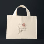 Mini Tote Bag Fleur d'aquarelle fille personnalisée<br><div class="desc">Reconnaissez la Flower Girl pour votre mariage avec ce sac fourre-tout personnalisé simple et sucré qui présente une fleur d'aquarelle douce et pastel dans un rose rose poussiéreux avec un script manuscrit titre FLOWER GIRL et personnalisée avec son nom. Le style de police et la couleur du nom peuvent être...</div>