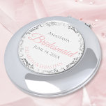 Miroir De Poche Bridesmaid Cadeau Compact Miroir rose argent<br><div class="desc">Ces miroirs compacts sont conçus pour donner des faveurs aux demoiselles d'honneur de votre mariage. Conçues pour s'harmoniser avec notre suite de mariage rose et gris élégant, elles présentent un design simple mais élégant avec un arrière - plan blanc, rose et gris, et une bordure florale en faux feuille d'argent....</div>