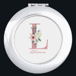 Miroir De Poche LETTRE Florale L Pink et bouquet ivoire<br><div class="desc">Miroir compact monogramme avec votre nom et votre numéro initial. La lettre fleurie L est conçue en parties scintillant rose rose et décorée d'un bouquet rose et ivoire de fleurs d'aquarelle et de verdure. Le modèle est configuré pour que vous puissiez ajouter votre nom dans un script en lettres de...</div>