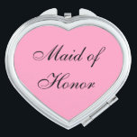 Miroir De Poche Maid of Honor Compact Mirror<br><div class="desc">Miroir compact en forme de coeur avec une couleur arrière - plan rose avec texte Maid of Honor en noir. Customisez cet objet ou achetez tel quel.</div>