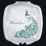 Miroir De Poche Miroir compacte de vigne Peacock turquoise<br><div class="desc">Personnalisez un cadeau unique pour vos Bridesmaids avec un miroir compacte Peacock Leaf Vine Compact Turquoise. Le design compact est composé d'un arrière - plan gris clair et d'un paon turquoise animé avec un embellissement en vigne. Personnalisez-vous avec le nom de la demoiselle d'honneur pour un souvenir précieux de votre...</div>