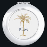 Miroir De Poche Monogramme de la marine Palmier d'or tropical arti<br><div class="desc">Customisez ce miroir compact monogrammé avec un palmier doré et un texte bleu marine avec votre touche spéciale. Vous pouvez changer le monogramme et le palmier à vos couleurs préférées. Fait un grand cadeau pour toute occasion.</div>
