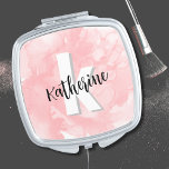Miroir De Poche Monogramme rose<br><div class="desc">Une aquarelle rose pâle et douce fournit la toile pour un monogramme mignon et contemporain, avec initiales et nom. La palette de couleurs noir et blanc du monogramme, composée de polices modernes propres mélangées à une police de script, dégage un charme simple mais amusant. Que vous souhaitiez utiliser votre prénom...</div>