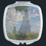 Miroir De Poche Une femme avec un parasol par Claude Monet<br><div class="desc">Femme avec un Parasol - Madame Monet et Son Fils de Claude Monet, huile sur toile 1875, est un tableau d'une femme en robe blanche tenant un parapluie sur la tête sur le sommet d'une colline couverte d'herbe et de fleurs sauvages, rétroéclairé contre un ciel bleu brillant et des nuages...</div>