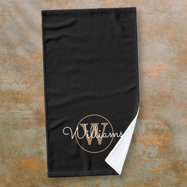 Moderne élégante monogramme noir et or nom script  (Modern Stylish Black Gold Monogram Script Name Hand Towel)