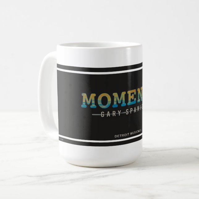 Moments ・ Detroit MusicMan ・ Mug 15 oz WHT (Devant gauche)