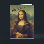 Mona Lisa Père Noël la carte de Noël Sleigh<br><div class="desc">Un Père Noël vintage et son traîneau plein de jouets volent à travers le ciel en l'arrière - plan de la célèbre Mona Lisa avec son sourire mystérieux. L'une d'une série de Cartes de Noël Artistes. L'intérieur est vide pour votre propre message personnel.</div>