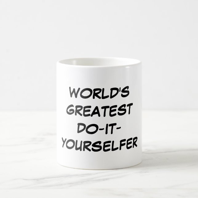 "Monde plus grand Faire-il-Yourselfer" tasse (Centre)