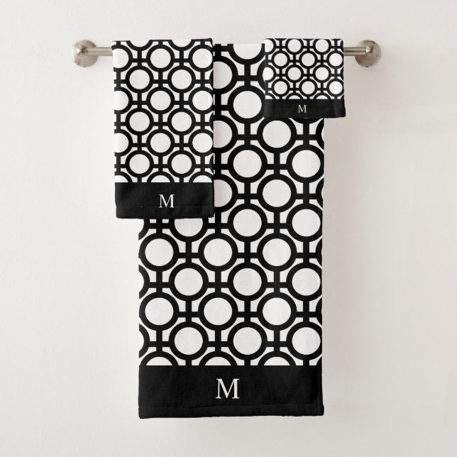 Monogramme et cercles abstraits noirs sur fond bla (En situation)