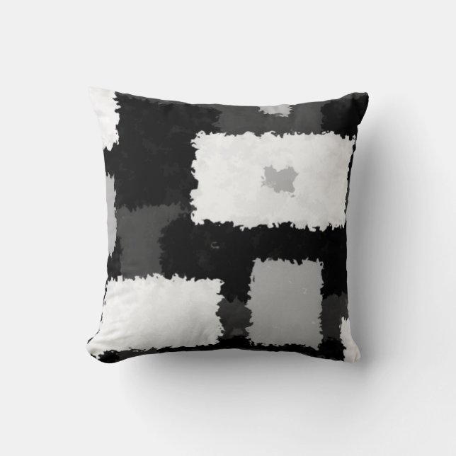 Monotone dans des coussins gris, noirs et blancs (Recto)