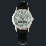 Montre Aquarelle tropicale Oasis moderne Feuille Motif<br><div class="desc">Découvrez notre collection de Motifs Feuilles Oasis moderne Tropical, maintenant disponible sur Zazzle! Plongez dans la beauté vibrante de la nature avec ces produits étonnants qui ont une touche contemporaine sur le feuillage tropical.Choisissez parmi une large gamme de produits pour répondre à vos besoins et style personnel. Que vous cherchiez...</div>
