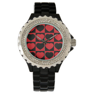 montre au poignet noir et rouge