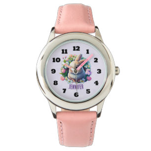 Montre Baby Bunny parmi les fleurs colorées de printemps