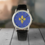 Montre Bleu Roi avec Fleur de Lys Or<br><div class="desc">Une montre bleu roi avec une Fleur de Lys couleur or : un cadeau parfait pour un homme élégant !</div>