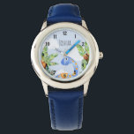 Montre Boys Jungle Aquarelle Dinosaure et nom Enfants<br><div class="desc">Ce design mignon et fantaisiste présente un dinosaure bleu aquarelle peint à la main dans une jungle,  et peut être personnalisé avec le nom de votre garçon. Idéal pour la première montre d'un enfant passionné de dinosaure. Découvrez notre magasin pour d'autres modèles magnifiques !</div>