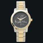 Montre Cadeau Élégant pour Demoiselle d'Honneur avec Mono<br><div class="desc">Un symbole intemporel d'appréciation, cette montre deux tons argent et or présente un monogramme gris classique sur un fond charbon profond. Les détails raffinés en écriture blanche ajoutent une touche de grâce, assurant que cette belle montre serve à la fois de cadeau fonctionnel et de memento élégant de votre jour...</div>