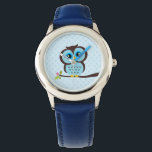 Montre Chouette bleue<br><div class="desc">La montre élégante personnalisée présente une illustration vectorielle douce d'un hibou perché sur une branche d'arbre sur un arrière - plan motif pois. Babystar Design à l'adresse mygrafico.com</div>