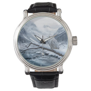 Montre Chouette des neiges sur une branche d'arbre d'hive