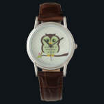 Montre Chouette verte mignonne<br><div class="desc">La montre élégante personnalisée présente une illustration vectorielle douce d'un hibou perché sur une branche d'arbre sur un arrière - plan motif pois. Babystar Design à l'adresse mygrafico.com</div>