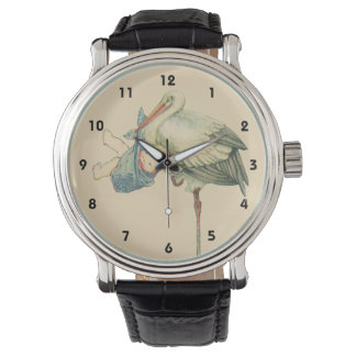 Montre Cigogne vintage portant un bébé garçon dans une co