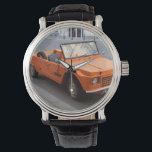 Montre Citroen orange Mehari<br><div class="desc">La Citroën Méhari est une voiture utilitaire légère et hors-route produite par l'automate français Citroën,  une variante de la Citroën 2CV.</div>