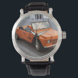 Montre Citroen orange Mehari<br><div class="desc">La Citroën Méhari est une voiture utilitaire légère et hors-route produite par l'automate français Citroën,  une variante de la Citroën 2CV.</div>