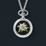 Montre collier Edelweiss<br><div class="desc">En allemand, "edel" signifie noble et "weiss" signifie blanc. Edelweiss symbolise la dévotion, la pureté noble, le courage, l'audace, la liberté et la capacité à surmonter l'adversité. Edelweiss pousse dans certaines des conditions alpines les plus difficiles au monde. Soyez inspiré par ce petit plante sachant que vous avez reçu des...</div>