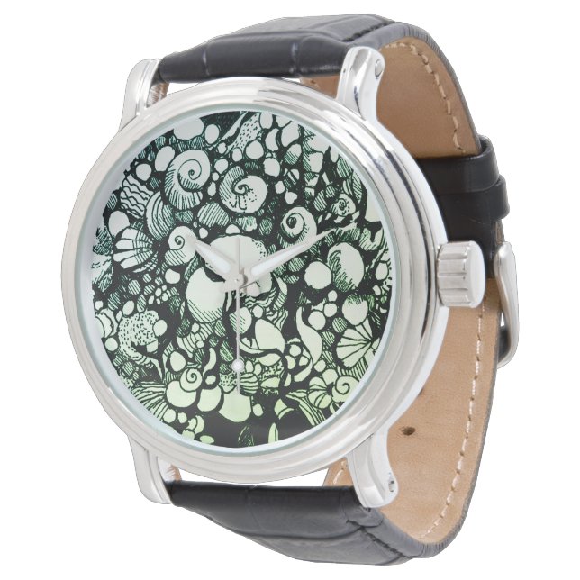 Montre coquillages sur le rivage (Incliné)