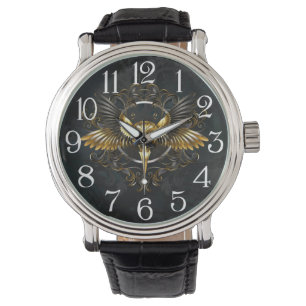Montre Crâne d'oiseaux dorés sur arrière - plan noir