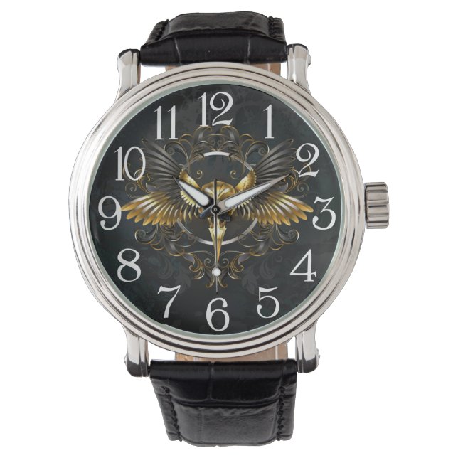 Montre Crâne d'oiseaux dorés sur arrière - plan noir (devant)