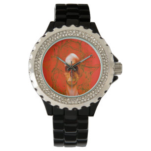 Montre Crâne orange dans l'eau