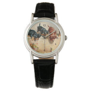 Montre Curieux Chiots Dachshund et une grenouille