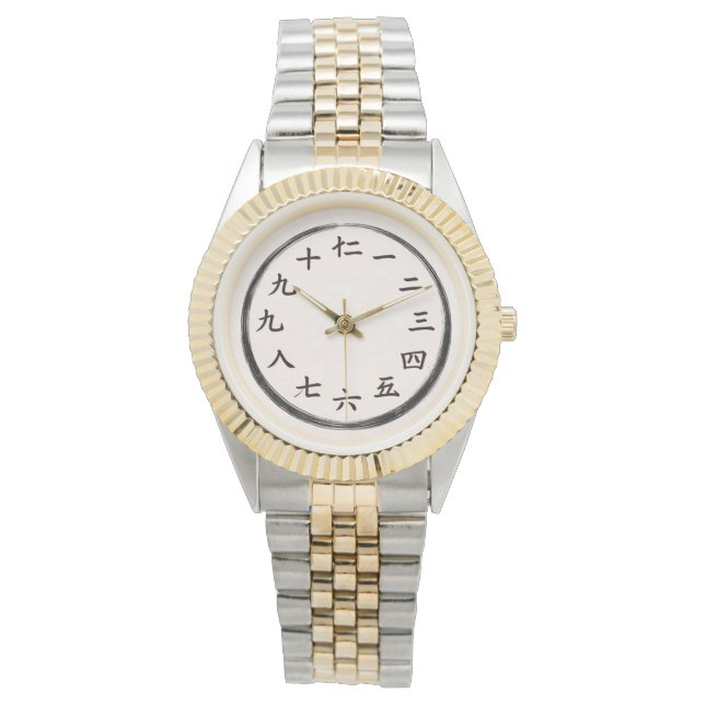 Montre de luxe à deux tons en or avec chiffres kan (devant)