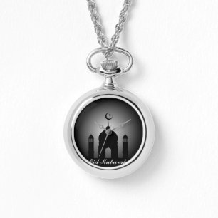 Montre Dôme mosquée et silhouette minaret