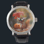 Montre Écureuil mignon avec parapluie à feuilles - Pluie<br><div class="desc">Cette adorable image présente un écureuil rouge debout sous la pluie,  tenant une grande feuille d'automne comme un parapluie au-dessus de la tête. Un citrouille sculpté se trouve à proximité,  ajoutant à l'ambiance festive d'automne. La photo capture un moment de charme et inattendu dans la nature.</div>