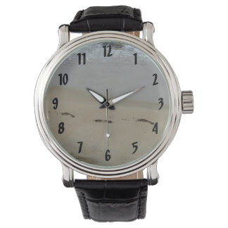Montre Empreintes dans le sable