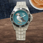 Montre Faune de la côte atlantique de Puffin Monogramme d<br><div class="desc">Profitez du charme du Puffin Atlantique avec cette montre élégante. Avec l'illustration de l'adorable oiseau de mer dressé contre un arrière - plan bleu océan, cette montre est parfaite pour tous ceux qui recherchent un design élégant et d'inspiration nature. Le visage de la montre peut être personnalisé avec votre initiale...</div>