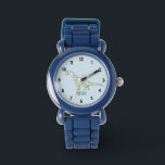 Montre Garçons Cute Blue Dinosaur avec nom Enfants<br><div class="desc">Cette jolie montre d'enfants bleus présente une adorable caricature de dinosaure et peut être personnalisée avec le nom de votre garçon. Avec des chiffres clairs et lisibles,  ce design est parfait pour la première montre de votre garçon.</div>